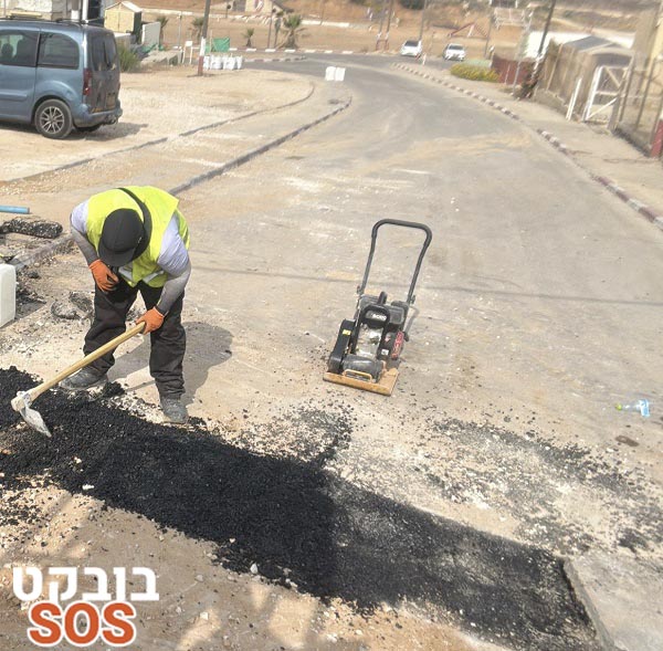 תיקון מפגע בכביש אספלט